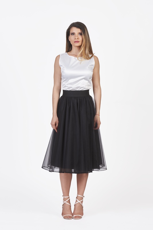 A trendy midi black tulle skirt with delicate edging, a poetic addition to your wardrobe.