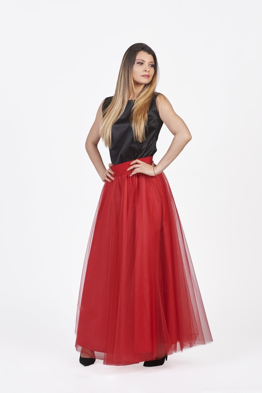 Stunning red tulle skirt featuring bold and beautiful design.
