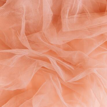 Delicate tulle fabric with a mesmerizing mesh pattern.